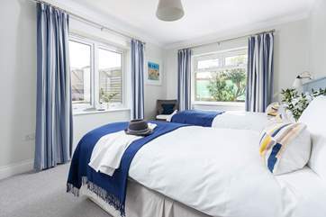 Bedroom 1 is a pretty twin bedroom, perfect for either children or adults.