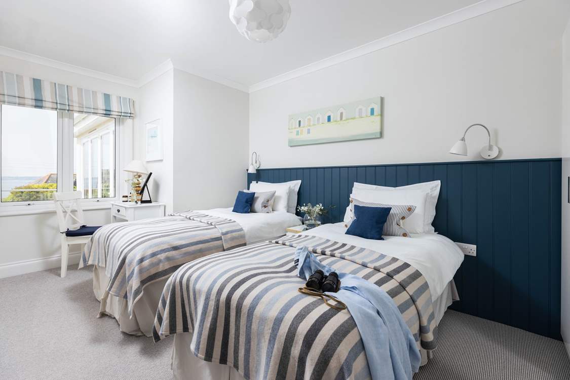Bedroom 3 is a twin bedroom with dreamy views.