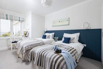 Bedroom 3 is a twin bedroom with dreamy views.