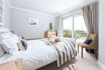 Each bedroom is beautifully furnished with luxury linens and super comfy beds.
