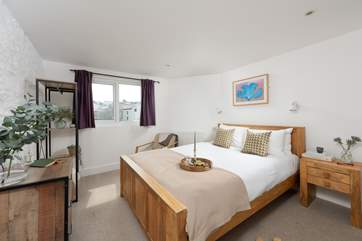 Bedroom five is located on the first floor. It has a comfy king-size bed and also has a fabulous en suite shower-room.