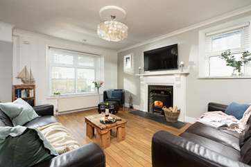 The cosy sitting-room complete with a toasty wood-burner.