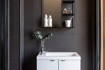 The downstairs cloakroom can be accessed from outside, and also from the dining room.