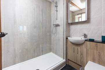 The en suite shower-room to bedroom 2, ideal to rinse salty toes after a beach day.