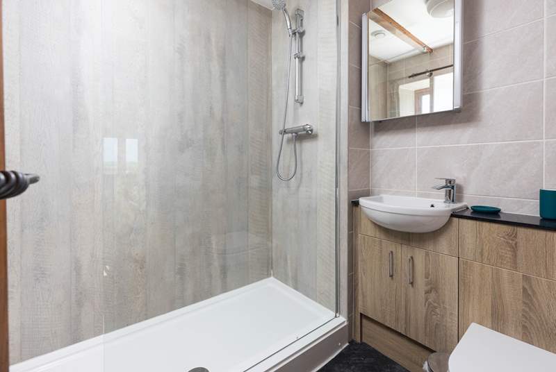 The en suite shower-room to bedroom 2, ideal to rinse salty toes after a beach day.