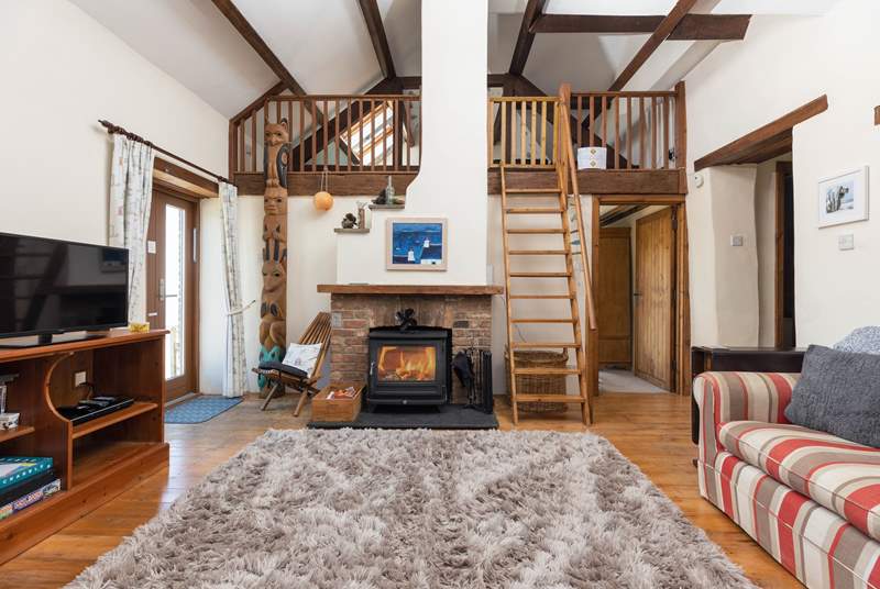 The cosy interiors and wood-burner make this the perfect year-round retreat.