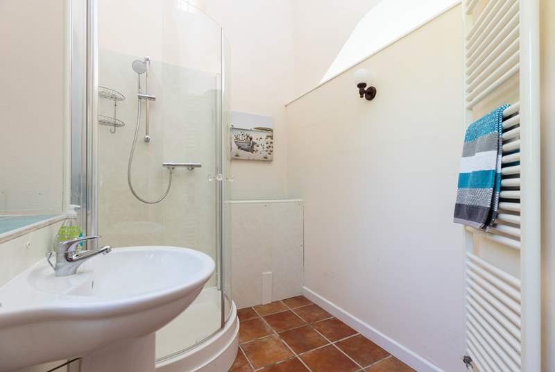 The convenient en suite shower-room for bedroom 1 has a shower and wash-basin but please note there is no WC.