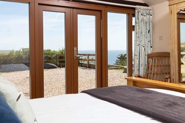 Bedroom 1 is on the lower ground floor with access to the terrace, the ideal place to drink in the view with your morning coffee.