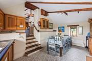 Down a short flight of steps, the kitchen/diner awaits.