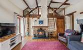 The cosy interiors and wood-burner make this the perfect year-round retreat. - Thumbnail Image