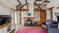The cosy interiors and wood-burner make this the perfect year-round retreat.
