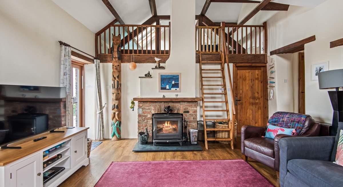 The cosy interiors and wood-burner make this the perfect year-round retreat.