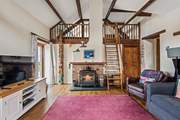The cosy interiors and wood-burner make this the perfect year-round retreat.