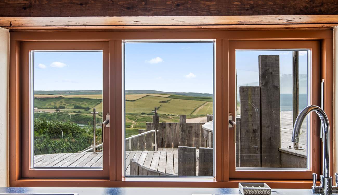 Washing up will be very distracting here with this view! Luckily there is an all-important dishwasher.