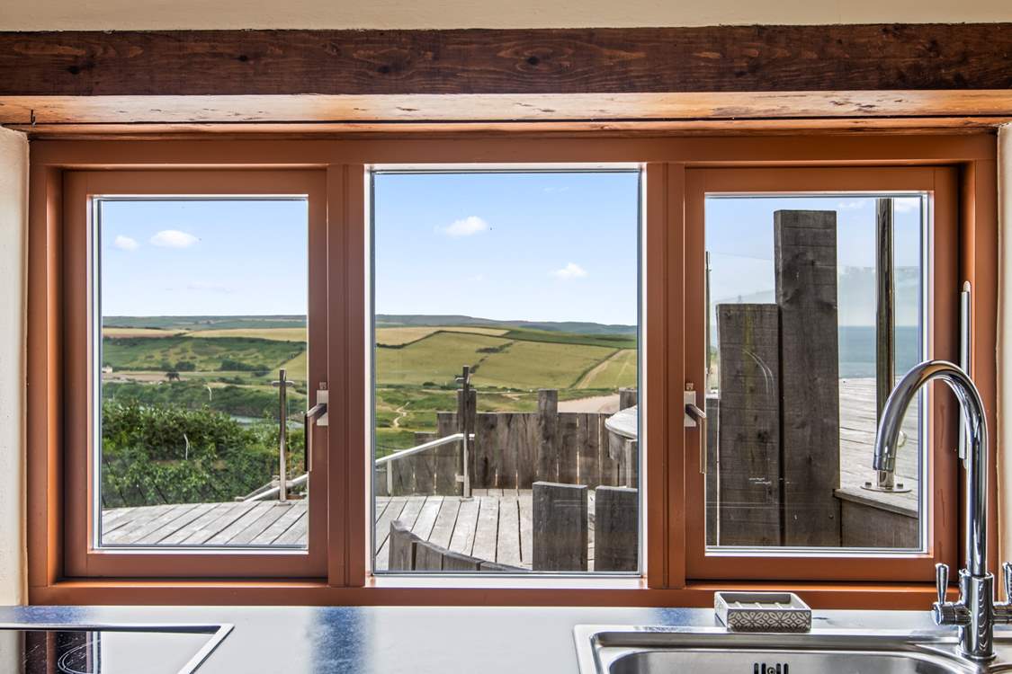 Washing up will be very distracting here with this view! Luckily there is an all-important dishwasher.