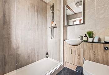 The en suite shower-room to bedroom 2, ideal for rinsing salty toes after a beach day.