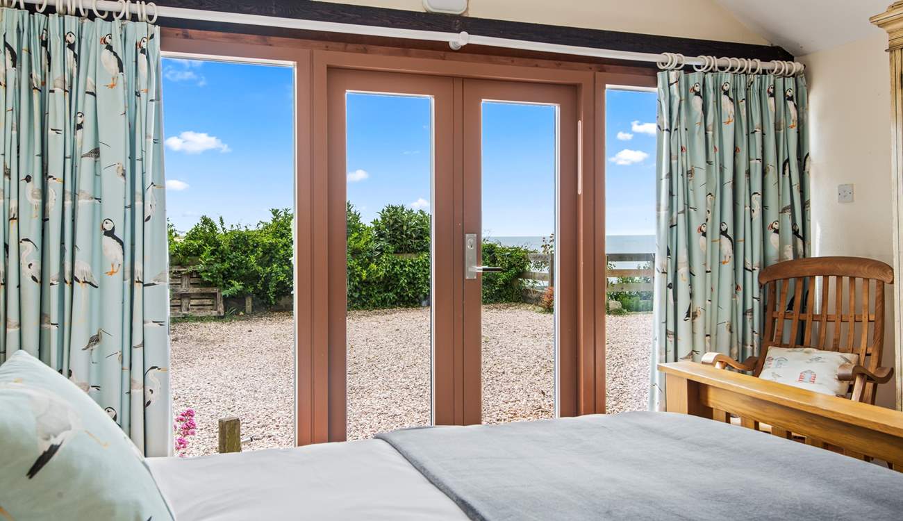 Bedroom 1 is on the lower ground floor with access to the terrace, the ideal place to drink in the view with your morning coffee.