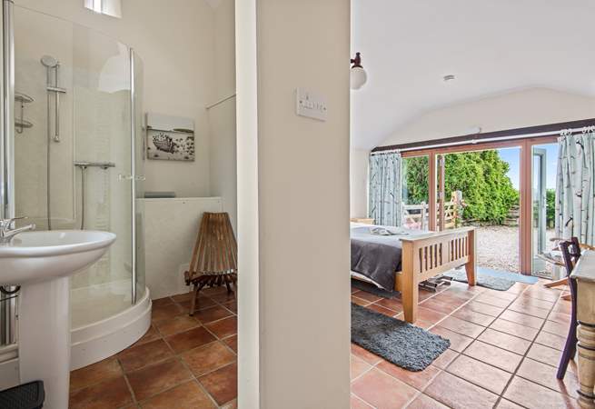 The convenient en suite shower-room for bedroom 1 has a shower and wash-basin but please note there is no WC.