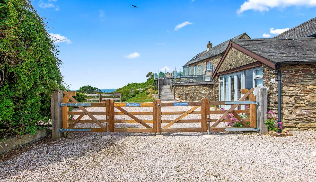 The parking is inside the gates.