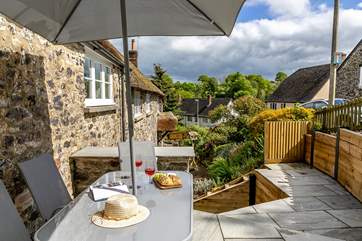 The pretty terrace is perfect for al fresco dining.