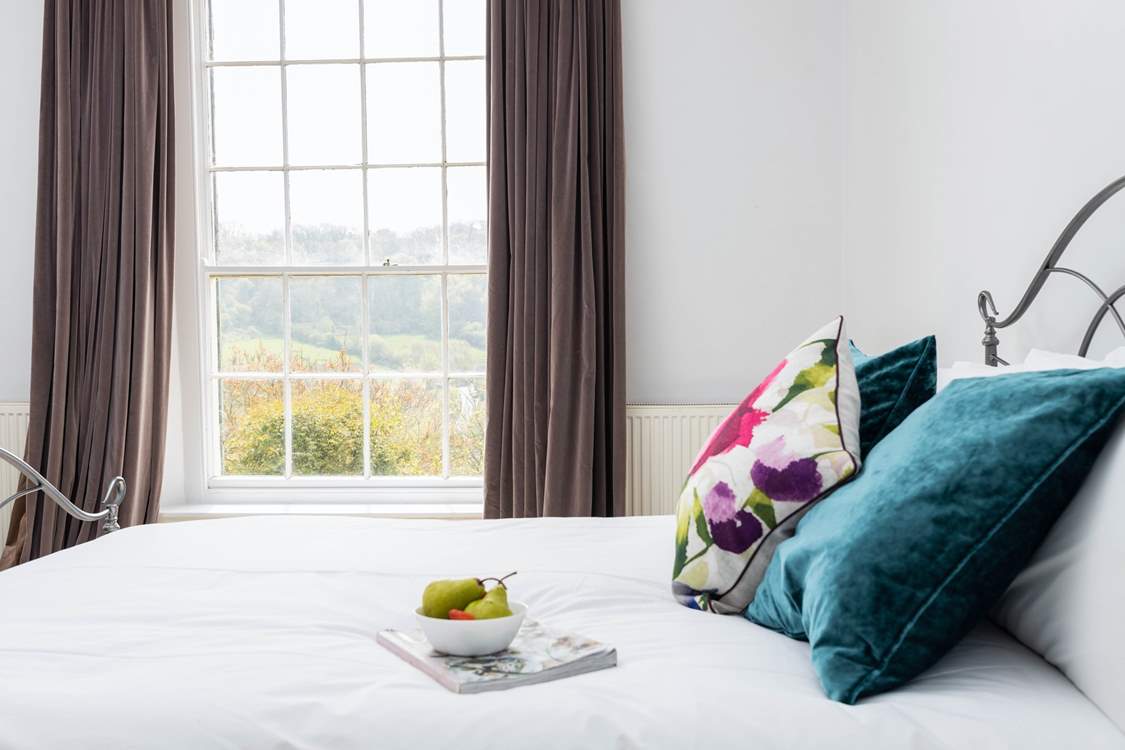 Wake to the crisp morning sun creeping in through the thick velvet curtains.