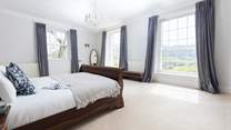 Wake up in one of the many opulent bedrooms.