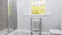The en suite's modern shower is great for unwinding after a big day out.