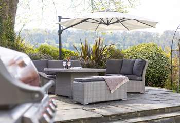 Settle down with a glass of something special in the cosy outdoor seating area.