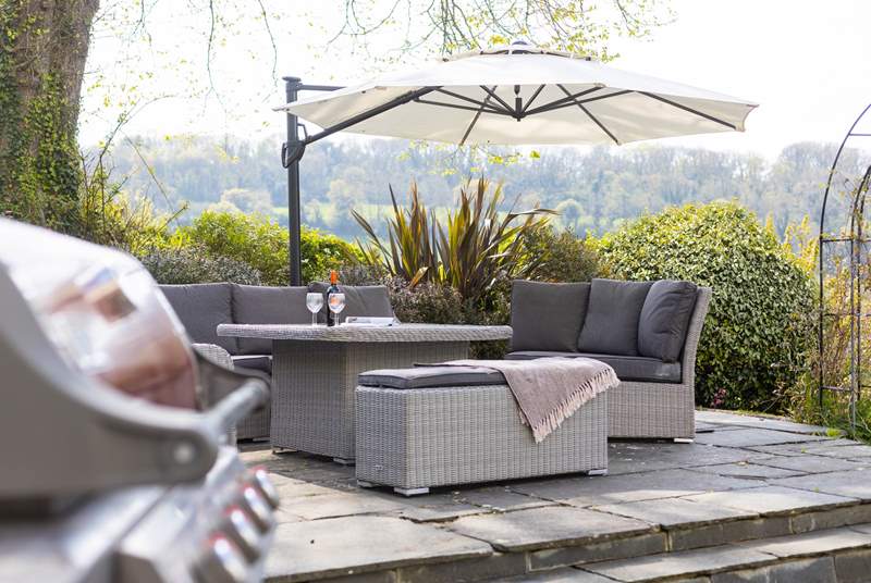 Settle down with a glass of something special in the cosy outdoor seating area.