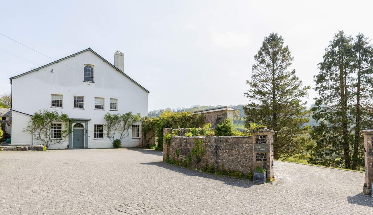 There is ample parking for four cars in front of the house.