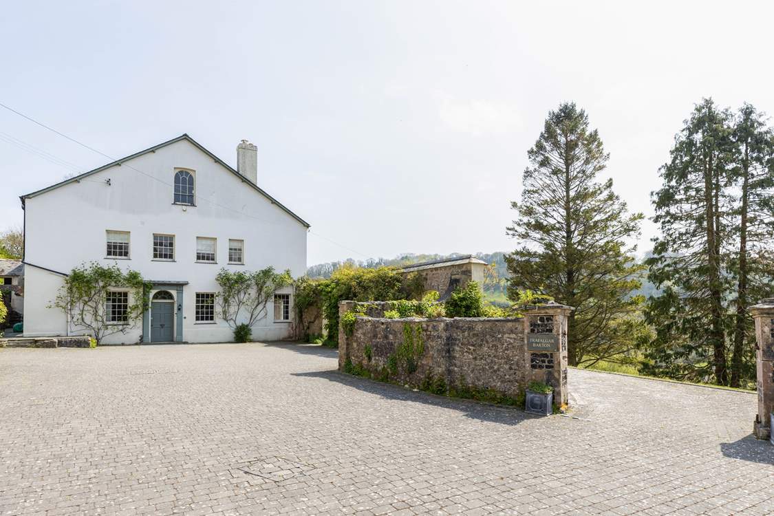 There is ample parking for four cars in front of the house.
