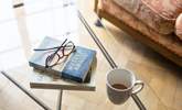 Relax with a good book and a cup of tea. - Thumbnail Image