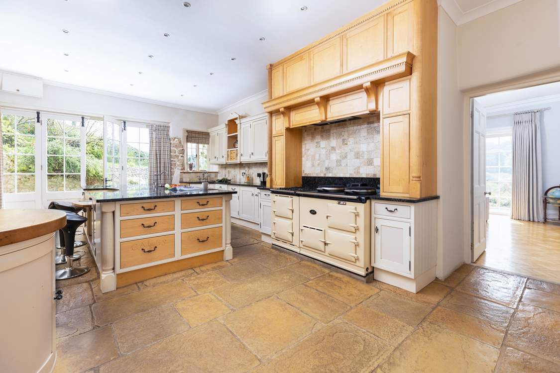 Prepare food in the magnificent kitchen.