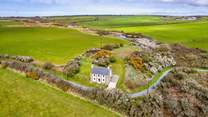 Surrounded by rolling meadows, near the sea. The perfect Welsh retreat. 