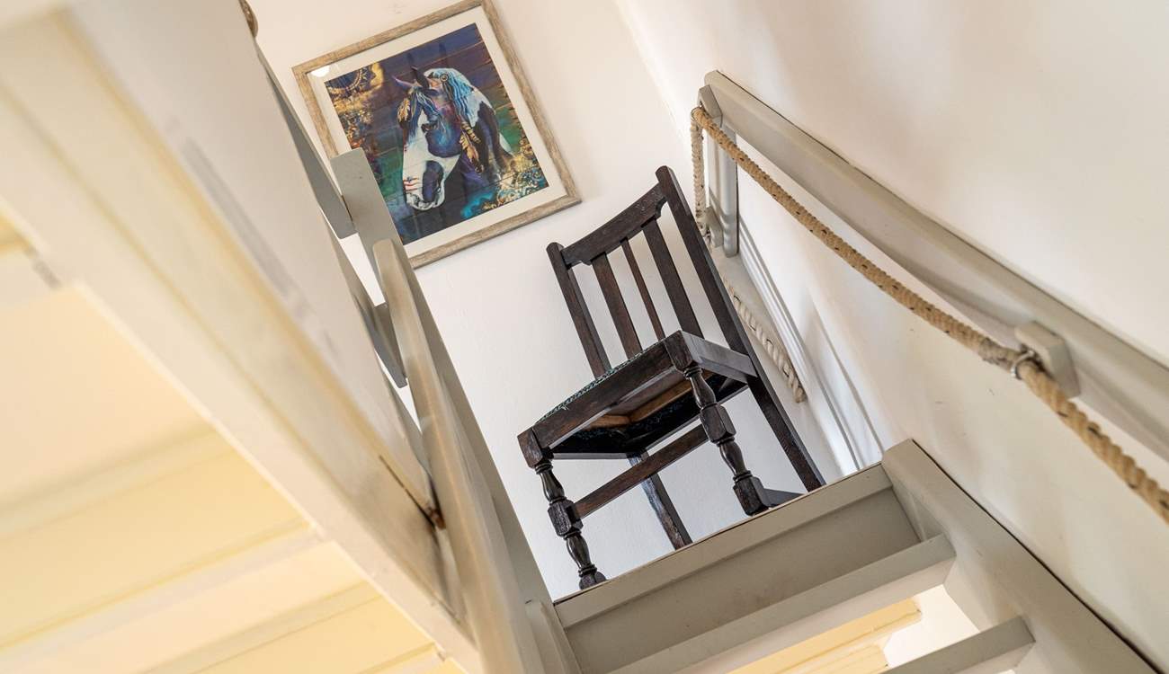 Take great care climbing the wooden hill. (The open tread stairs are wooden, painted  with a banister one side and rope on the other)