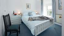 Bedroom 1 is a sweet king room.