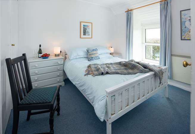 Bedroom 1 is a sweet king room.