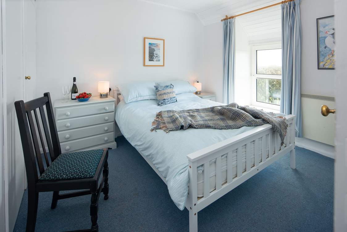 Bedroom 1 is a sweet king room.