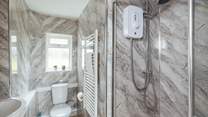 Stylish ground floor shower room. The family bathroom is located on the first floor. 