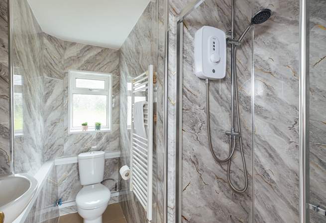 Stylish ground floor shower room. The family bathroom is located on the first floor. 