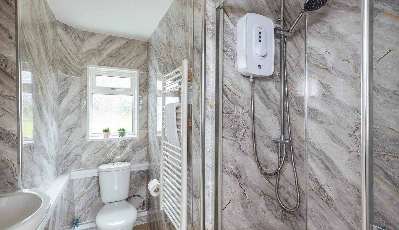 Stylish ground floor shower room. The family bathroom is located on the first floor. 