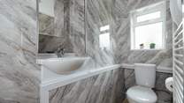Ideal for sandy toes, the ground floor shower room. 
