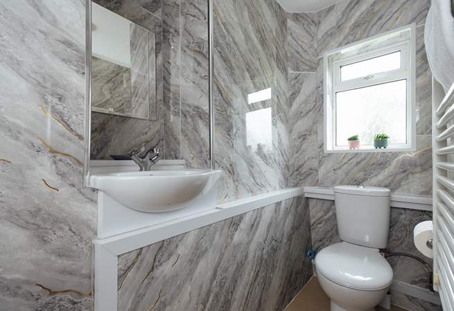 Ideal for sandy toes, the ground floor shower room. 