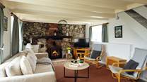 After a day exploring the local glorious beaches and pretty seaside villages relax in the idyllic sitting room. 