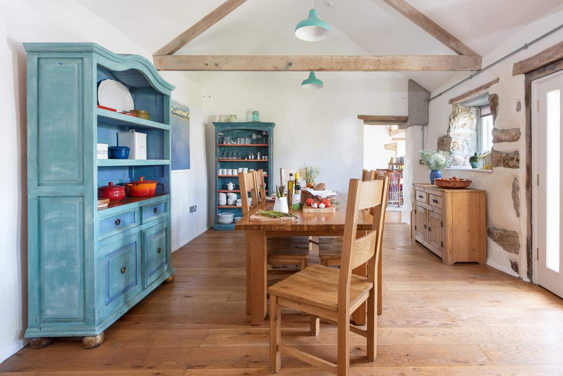 The oh so lovely kitchen and dining space, which leads up one step into the more formal dining-area.