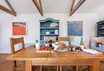 The charming farmhouse kitchen is perfect for informal suppers.