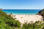 The white sand and unbelievably blue sea of Porthcurno awaits.