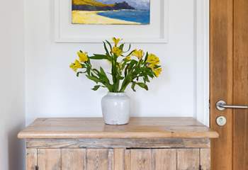 The owners beautiful artwork is displayed throughout the cottage.