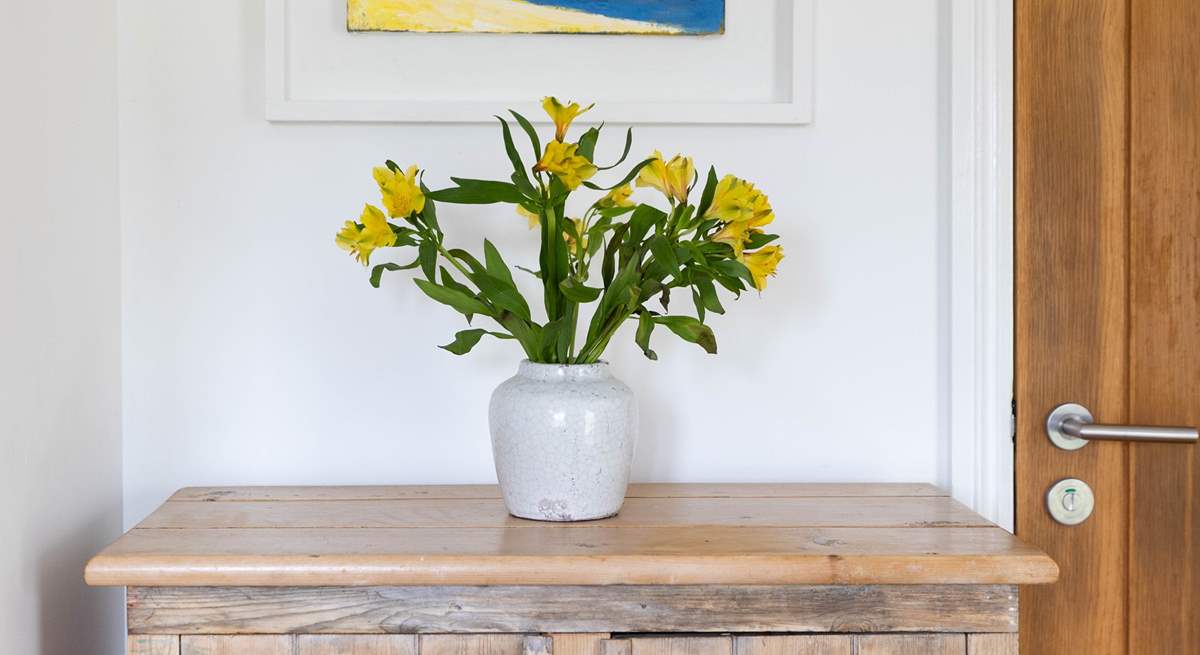 The owners beautiful artwork is displayed throughout the cottage.