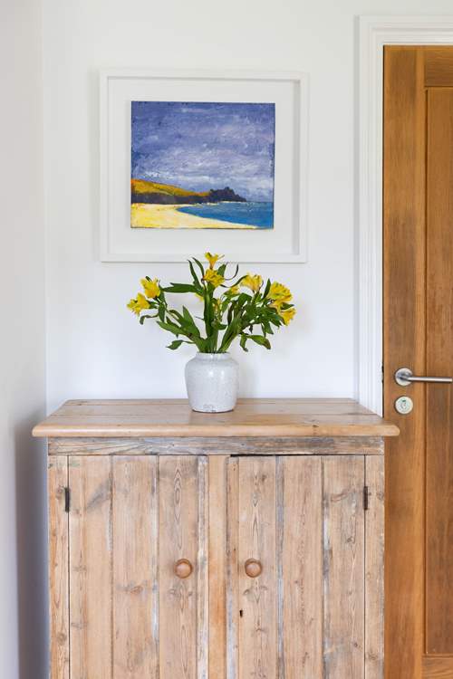 The owners beautiful artwork is displayed throughout the cottage.